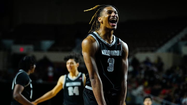 Millennium forward Cameron Holmes (3) celebrates a Sabien Cain three followed by a Perry timeout during the Open State Championship game at Arizona Veterans Memorial Coliseum.