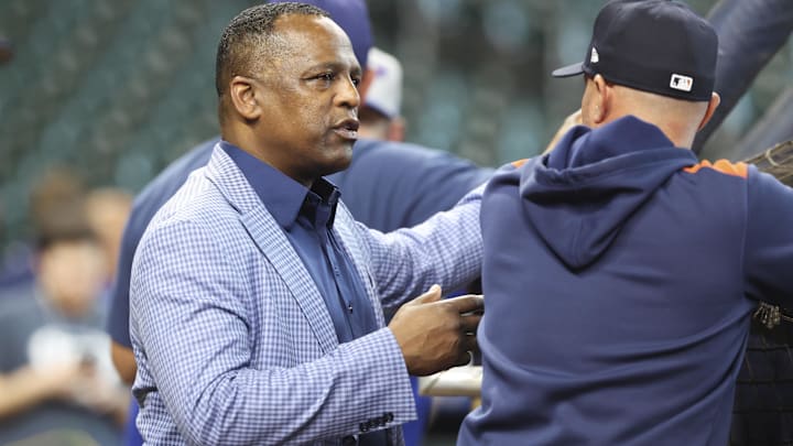 Houston Astros general manager Dana Brown talks to a coach during pre-game activities Houston Astros general manager Dana Brown talks to a coach during pre-game activities