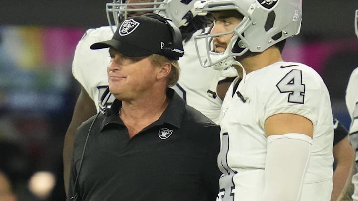 Oct 4, 2021; Inglewood, California, USA; Las Vegas Raiders head coach Jon Gruden talks with quarterback Derek Carr (4) during the second half against the Los Angeles Chargers at SoFi Stadium. Mandatory Credit: Robert Hanashiro-Imagn Images Oct 4, 2021; Inglewood, California, USA; Las Vegas Raiders head coach Jon Gruden talks with quarterback Derek Carr (4) during the second half against the Los Angeles Chargers at SoFi Stadium. Mandatory Credit: Robert Hanashiro-Imagn Images