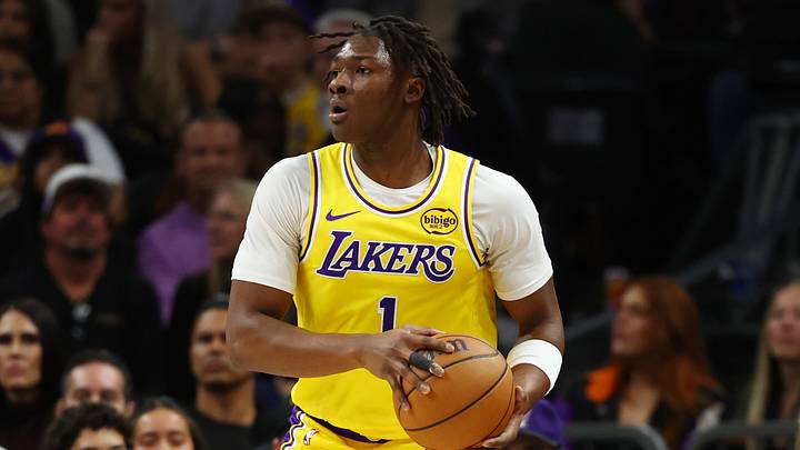 Dec 23, 2025; Phoenix, Arizona, USA; Los Angeles Lakers forward Adou Thiero (1) against the Phoenix Suns at Mortgage Matchup Center. Mandatory Credit: Mark J. Rebilas-Imagn Images Dec 23, 2025; Phoenix, Arizona, USA; Los Angeles Lakers forward Adou Thiero (1) against the Phoenix Suns at Mortgage Matchup Center. Mandatory Credit: Mark J. Rebilas-Imagn Images