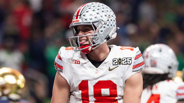 Jan 20, 2025; Atlanta, GA, USA; Ohio State Buckeyes quarterback Will Howard (18) against the Notre Dame Fighting Irish during the CFP National Championship college football game at Mercedes-Benz Stadium. Mandatory Credit: Mark J. Rebilas-Imagn Images Jan 20, 2025; Atlanta, GA, USA; Ohio State Buckeyes quarterback Will Howard (18) against the Notre Dame Fighting Irish during the CFP National Championship college football game at Mercedes-Benz Stadium. Mandatory Credit: Mark J. Rebilas-Imagn Images