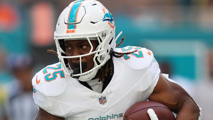 Miami Dolphins running back Jaylen Wright (25) runs the ball against the New York Jets during the first half at Hard Rock Stadium in December 2024. Miami Dolphins running back Jaylen Wright (25) runs the ball against the New York Jets during the first half at Hard Rock Stadium in December 2024.