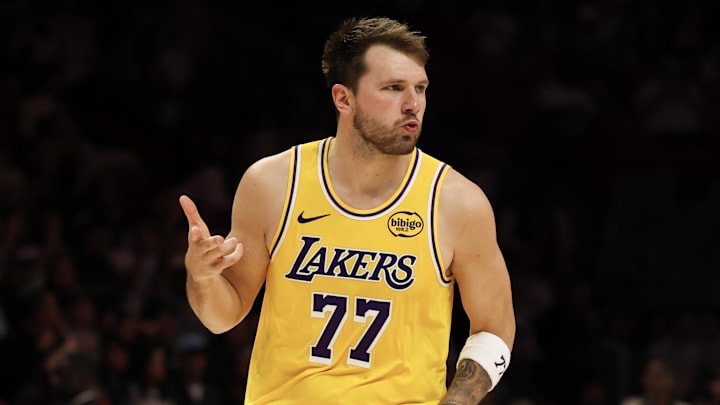 Mar 19, 2026; Miami, Florida, USA; Los Angeles Lakers guard Luka Doncic (77) reacts against the Miami Heat during the second half at Kaseya Center. Mandatory Credit: Isabella Frias-Imagn Images