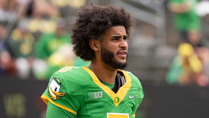 Oregon quarterback Dante Moore warms up as the Oregon Ducks host the Oklahoma State Cowboys on Sept. 6, 2025, at Autzen Stadium in Eugene, Oregon.