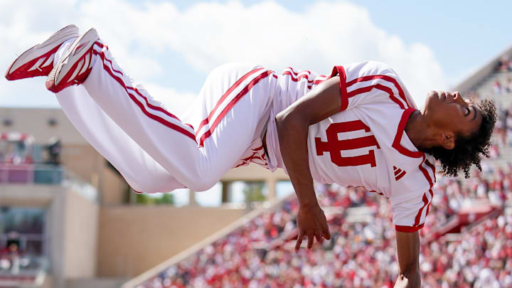 Sep 6, 2025; Bloomington, Indiana, USA; An Indiana Hoosiers cheerleader performs during the first half against the Kennesaw State Owls at Memorial Stadium. Mandatory Credit: Robert Goddin-Imagn Images Sep 6, 2025; Bloomington, Indiana, USA; An Indiana Hoosiers cheerleader performs during the first half against the Kennesaw State Owls at Memorial Stadium. Mandatory Credit: Robert Goddin-Imagn Images