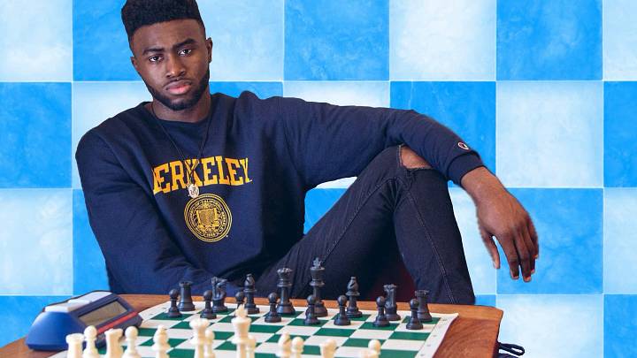 Jaylen Brown posing at a chess table Jaylen Brown posing at a chess table