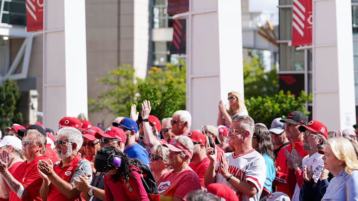 Fans clap and cheer during a statue unveiling for former Cincinnati Reds sportscaster Marty Brennaman at Crosley Terrace, Saturday, Sept. 6, 2025, at Great American Ball Park in downtown Cincinnati. Fans clap and cheer during a statue unveiling for former Cincinnati Reds sportscaster Marty Brennaman at Crosley Terrace, Saturday, Sept. 6, 2025, at Great American Ball Park in downtown Cincinnati.