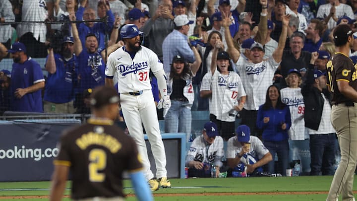 Oct 11, 2024; Los Angeles, California, USA; Los Angeles Dodgers outfielder Teoscar Hernandez (37) celebrates after hitting a solo home run in the seventh inning against the San Diego Padres during game five of the NLDS for the 2024 MLB Playoffs at Dodger Stadium.