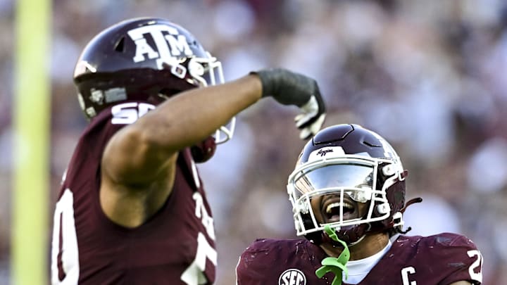 Sep 27, 2025; College Station, Texas, USA; Texas A&M Aggies linebacker Taurean York (21) celebrates with defensive end Dayon Hayes (50) against the Auburn Tigers during the fourth quarter at Kyle Field. Mandatory Credit: Maria Lysaker-Imagn Images 
