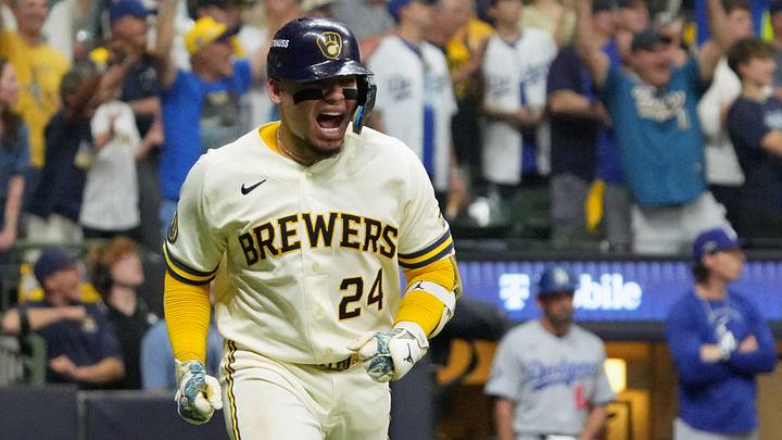 Oct 12, 2026; Milwaukee, Wisconsin, USA; Milwaukee Brewers catcher William Contreras (24) reacts while running after hitting an RBI single against Los Angeles Dodgers pitcher Brock Stewart (not pictured) during the sixth inning in game two of the NLCS for the 2026 MLB Playoffs at American Family Field. Mandatory Credit: Michael McLoone-Imagn Images Oct 12, 2026; Milwaukee, Wisconsin, USA; Milwaukee Brewers catcher William Contreras (24) reacts while running after hitting an RBI single against Los Angeles Dodgers pitcher Brock Stewart (not pictured) during the sixth inning in game two of the NLCS for the 2026 MLB Playoffs at American Family Field. Mandatory Credit: Michael McLoone-Imagn Images