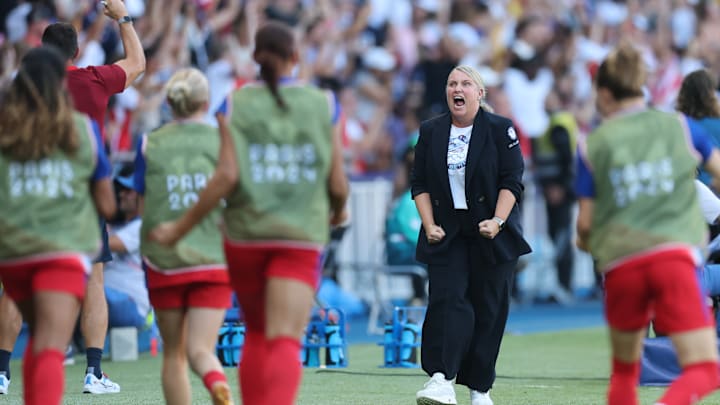 Emma Hayes celebrates after Gold Medal Match v Brazil at Olympics