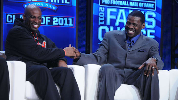 Deion Sanders and Michael Irvin at the 2011 Pro Football Hall of Fame announcement show at the Super Bowl XLV media center.