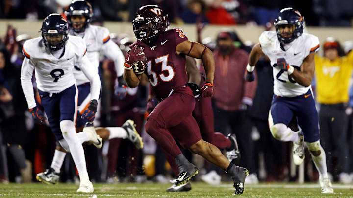Virginia Tech Hokies running back Bhayshul Tuten breaks away for a TD against Virginia. Tuten could rate among the combine's fastest runners.