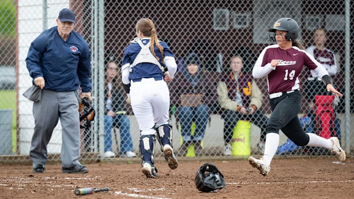 Junction City’s Lily Buendia (14) came within one RBI of tying the state single-season record last season.