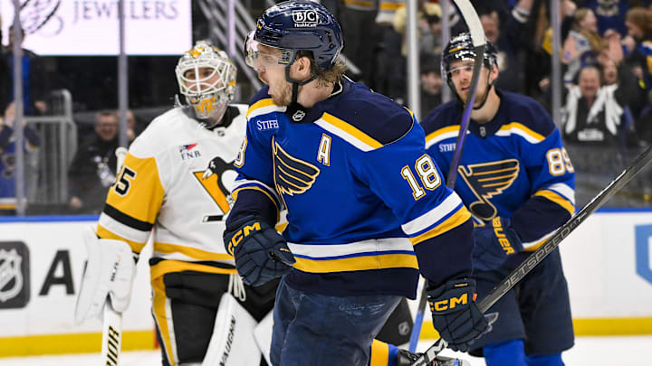 Apr 3, 2025; St. Louis, Missouri, USA;  St. Louis Blues center Robert Thomas (18) reacts after scoring the game winning goal against Pittsburgh Penguins goaltender Tristan Jarry (35) during overtime at Enterprise Center. Mandatory Credit: Jeff Curry-Imagn Images