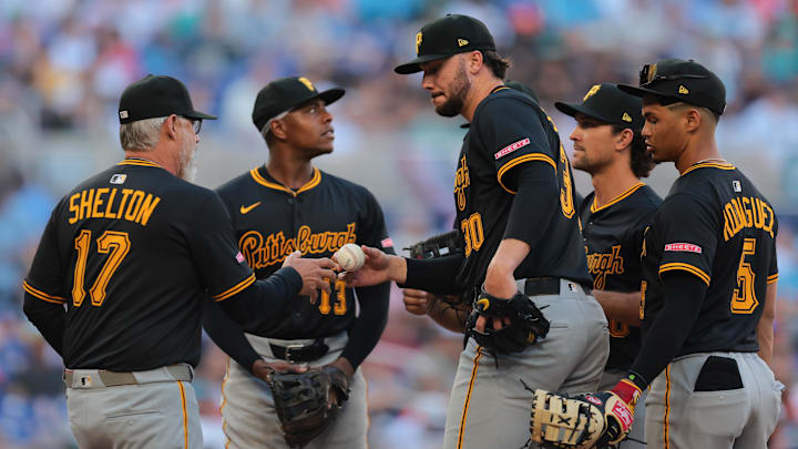 Mar 27, 2025; Miami, Florida, USA; Pittsburgh Pirates manager Derek Shelton (17) takes starting pitcher Paul Skenes (30) out of the game against the Miami Marlins during the sixth inning at loanDepot Park. Mandatory Credit: Sam Navarro-Imagn Images