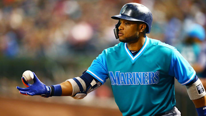 Seattle Mariners second baseman Robinson Cano holds a baseball during a game against the Arizona Diamondbacks on Aug. 24, 2018, at Chase Field.