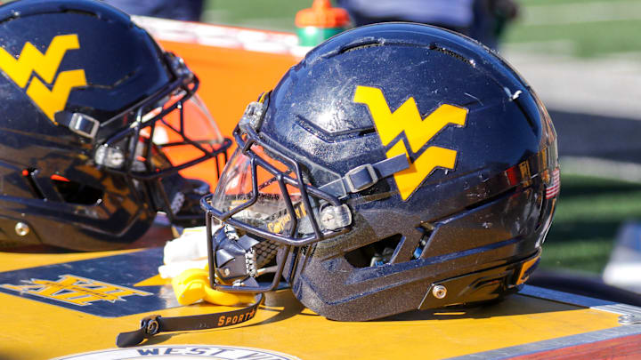 Aug 30, 2025; Morgantown, West Virginia, USA; A West Virginia Mountaineers football helmet is seen along the sidelines during the fourth quarter against the Robert Morris Colonials at Milan Puskar Stadium. Mandatory Credit: Ben Queen-Imagn Images