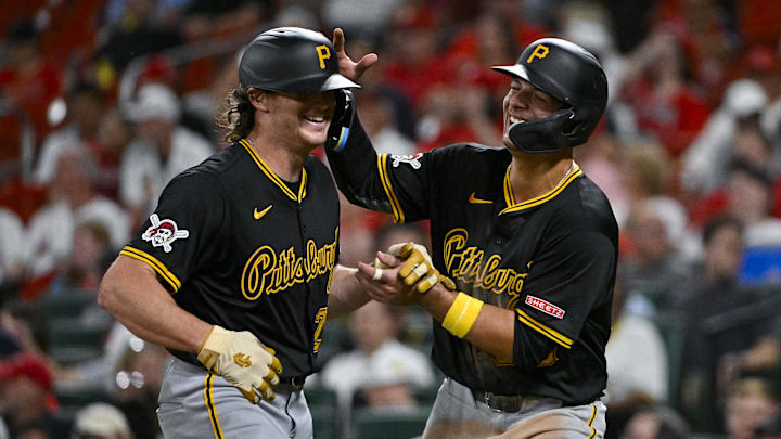 Sep 18, 2024; St. Louis, Missouri, USA;  Pittsburgh Pirates center fielder Billy Cook (28) is congratulated by  third baseman Nick Yorke (38) after hitting a three run home run against the St. Louis Cardinals during the sixth inning at Busch Stadium. Mandatory Credit: Jeff Curry-Imagn Images