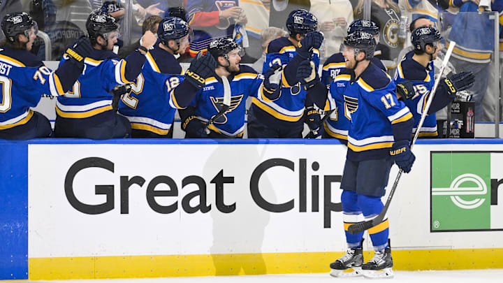 Apr 24, 2025; St. Louis, Missouri, USA; St. Louis Blues defenseman Cam Fowler (17) is congratulated by teammates after scoring against the Winnipeg Jets during the first period in game three of the first round of the 2025 Stanley Cup Playoffs at Enterprise Center. Mandatory Credit: Jeff Curry-Imagn Images