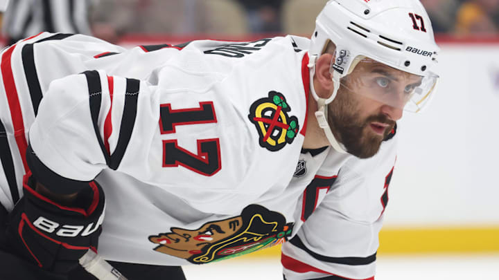 Apr 8, 2025; Pittsburgh, Pennsylvania, USA;  Chicago Blackhawks left wing Nick Foligno (17) at the face-off circle against the Pittsburgh Penguins during the third period at PPG Paints Arena. Mandatory Credit: Charles LeClaire-Imagn Images