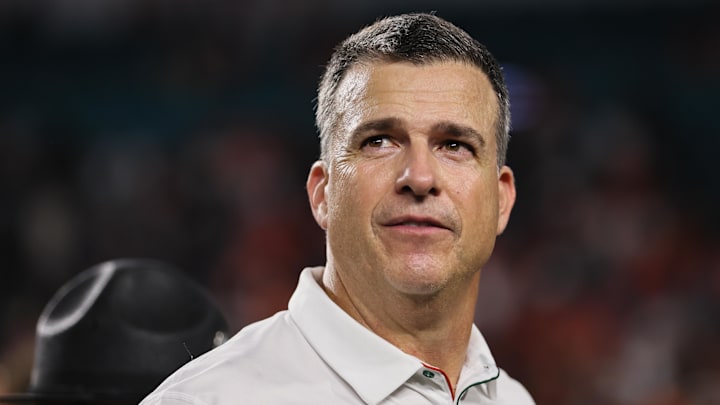 Oct 26, 2024; Miami Gardens, Florida, USA; Miami Hurricanes head coach Mario Cristobal looks on after the game against the Florida State Seminoles at Hard Rock Stadium. Mandatory Credit: Sam Navarro-Imagn Images Oct 26, 2024; Miami Gardens, Florida, USA; Miami Hurricanes head coach Mario Cristobal looks on after the game against the Florida State Seminoles at Hard Rock Stadium. Mandatory Credit: Sam Navarro-Imagn Images