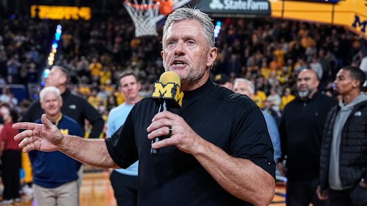 Michigan football head coach Kyle Whittingham speaks as he is being introduced on the floor during the first half between Michigan and USC at Crisler Center in Ann Arbor on Friday, Jan. 2, 2026.