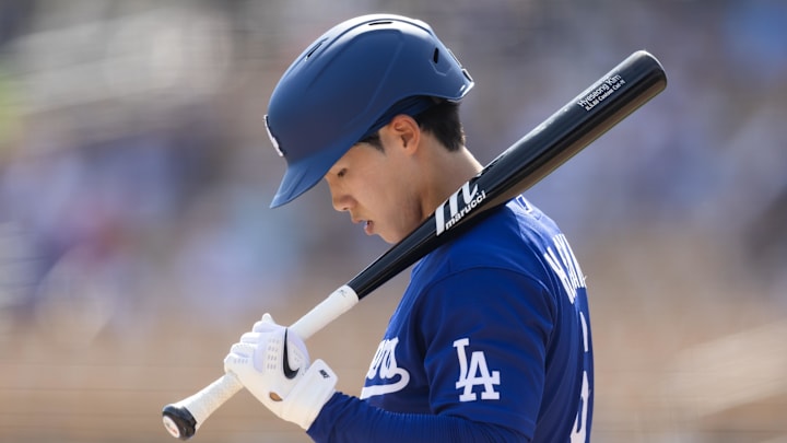 Feb 26, 2026; Phoenix, Arizona, USA; Los Angeles Dodgers second baseman Hyeseong Kim against the Chicago White Sox during a spring training game at Camelback Ranch-Glendale. Mandatory Credit: Mark J. Rebilas-Imagn Images