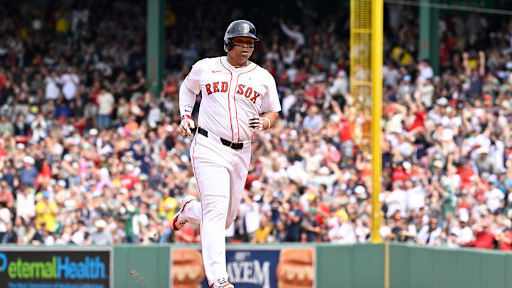 Jun 15, 2025; Boston, Massachusetts, USA; Boston Red Sox designated hitter Rafael Devers (11) runs the bases after hitting a one run home run against the New York Yankees during the fifth inning at Fenway Park. Mandatory Credit: Eric Canha-Imagn Images