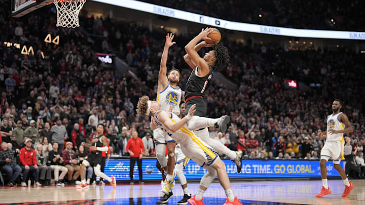 Portland Trail Blazers guard Shaedon Sharpe and Golden State Warriors guard Brandin Podziemski at Moda Center. Portland Trail Blazers guard Shaedon Sharpe and Golden State Warriors guard Brandin Podziemski at Moda Center.