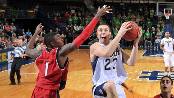 Devin Sweetney (1), then a player at Saint Francis University, defends a shot by Notre Dame guard Ben Hansbrough (23) during a 2009 college basketball game. Sweetney, a graduate of Maryland's Riverdale Baptist School, was recently named Associate head coach of the Red Flash.