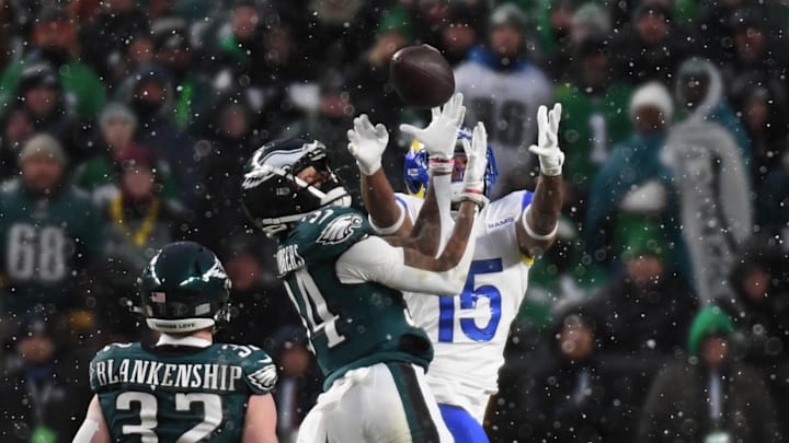 Jan 19, 2025; Philadelphia, Pennsylvania, USA; Los Angeles Rams wide receiver Demarcus Robinson (15) catches a pass in front of Philadelphia Eagles cornerback Isaiah Rodgers (34) in the first half in a 2025 NFC divisional round game at Lincoln Financial Field. Mandatory Credit: Eric Hartline-Imagn Images Jan 19, 2025; Philadelphia, Pennsylvania, USA; Los Angeles Rams wide receiver Demarcus Robinson (15) catches a pass in front of Philadelphia Eagles cornerback Isaiah Rodgers (34) in the first half in a 2025 NFC divisional round game at Lincoln Financial Field. Mandatory Credit: Eric Hartline-Imagn Images
