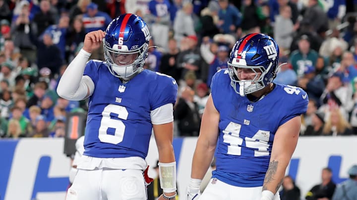 Oct 9, 2025; East Rutherford, New Jersey, USA; New York Giants quarterback Jaxson Dart (6) and running back Cam Skattebo (44) celebrate Skattebo's touchdown against the Philadelphia Eagles during the second quarter at MetLife Stadium. Mandatory Credit: Brad Penner-Imagn Images