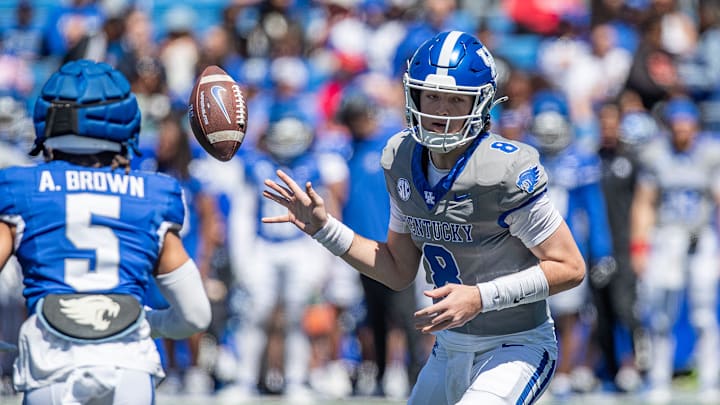 Kentucky freshman quarterback Cutter Boley (8) tossed the ball to Anthony Brown-Stephens (5) during the Kentucky Wildcats' Blue White scrimmage at Kroger Field on Saturday afternoon in Lexington, Kentucky. April 13, 2024