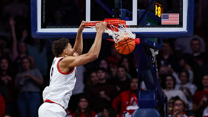 Nov 4, 2024; Tucson, Arizona, USA; Arizona Wildcats forward Carter Bryant (9) dunks the ball during the first half against the Canisius Golden Griffins at McKale Center.