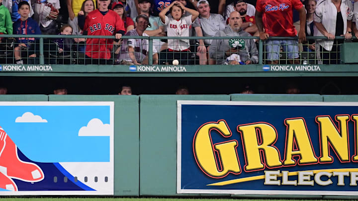 Jul 28, 2024; Boston, Massachusetts, USA; Fans and the Boston Red Sox bullpen watch bas a ball hit by New York Yankees third baseman Oswaldo Cabrera (95) (not pictured) bounces into the bullpen for a Yankees' RBI double during the eighth inning at Fenway Park. Mandatory Credit: Eric Canha-Imagn Images Jul 28, 2024; Boston, Massachusetts, USA; Fans and the Boston Red Sox bullpen watch bas a ball hit by New York Yankees third baseman Oswaldo Cabrera (95) (not pictured) bounces into the bullpen for a Yankees' RBI double during the eighth inning at Fenway Park. Mandatory Credit: Eric Canha-Imagn Images