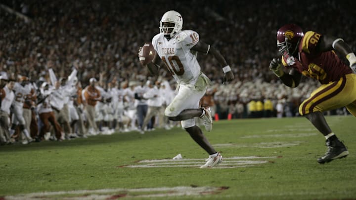 Texas quarterback Vince Young outruns the Southern California defense for the game-winning touchdown in the 2006 Rose Bowl in Pasadena, Calif.