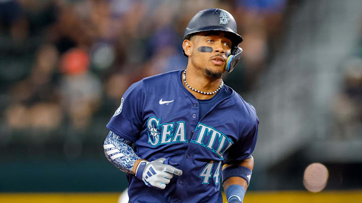 Seattle Mariners center fielder Julio Rodríguez hits a home run during a game against the Texas Rangers on Saturday at T-Mobile Park.