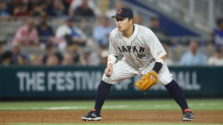 Mar 21, 2023; Miami, Florida, USA; Japan third baseman Munetaka Murakami (55) plays his position during the sixth inning against the USA at LoanDepot Park. Mandatory Credit: Sam Navarro-Imagn Images