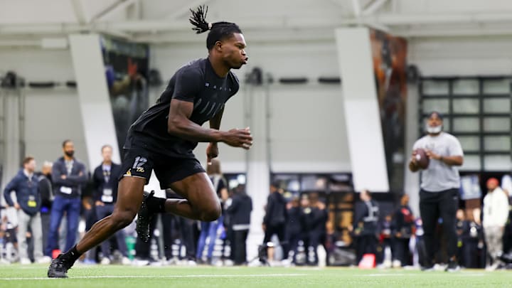 Apr 4, 2025; Boulder, CO, USA; Colorado Buffaloes wide receiver Travis Hunter (12) runs drills at the University of Colorado NFL Showcase at the CU Indoor Practice Facility. Apr 4, 2025; Boulder, CO, USA; Colorado Buffaloes wide receiver Travis Hunter (12) runs drills at the University of Colorado NFL Showcase at the CU Indoor Practice Facility.