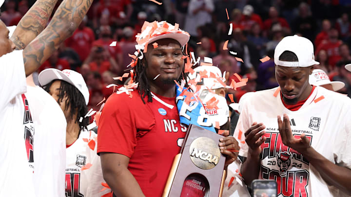 Mar 31, 2024; Dallas, TX, USA; North Carolina State Wolfpack forward DJ Burns Jr. (30) celebrates making it to the Final Four of March Madness.