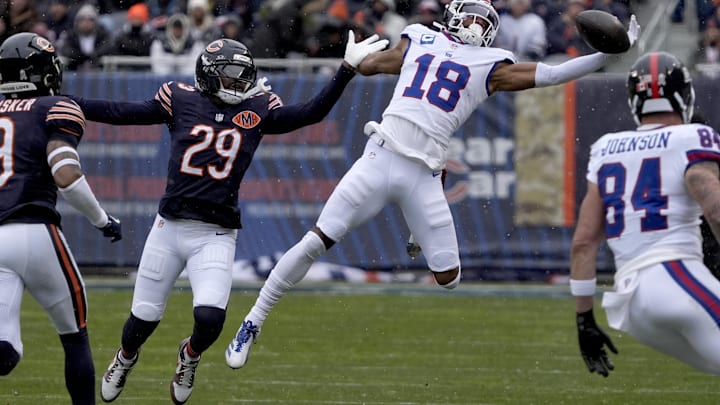 Nov 9, 2025; Chicago, Illinois, USA; Buffalo Bills wide receiver Elijah Moore (18) makes a catch against Chicago Bears cornerback Tyrique Stevenson (29) during the first half at Soldier Field. Mandatory Credit: David Banks-Imagn Images