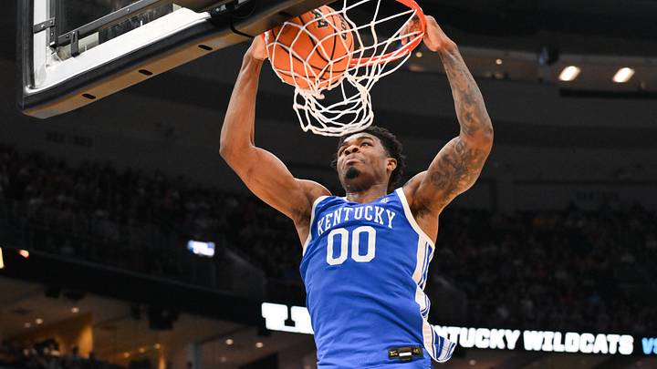 Mar 22, 2026; St. Louis, MO, USA; Kentucky Wildcats guard Otega Oweh (00) dunks during the second half against the Iowa State Cyclones during a second round game of the men's 2026 NCAA Tournament at Enterprise Center. Mandatory Credit: Jeff Curry-Imagn Images