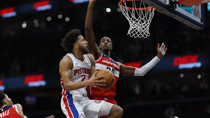 Nov 17, 2024; Washington, District of Columbia, USA; Detroit Pistons guard Cade Cunningham (2) shoots the ball as Washington Wizards forward Alexandre Sarr (20) defends in the first half at Capital One Arena. Mandatory Credit: Geoff Burke-Imagn Images