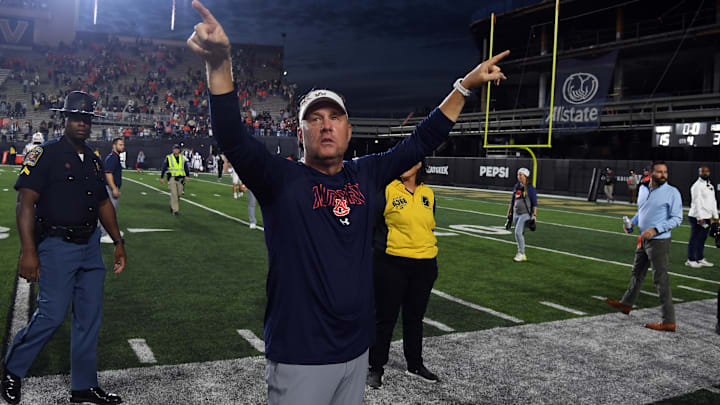 Nov 4, 2023; Nashville, Tennessee, USA; Auburn Tigers head coach Hugh Freeze celebrates with fans after a win against the Vanderbilt Commodores at FirstBank Stadium. Mandatory Credit: Christopher Hanewinckel-Imagn Images