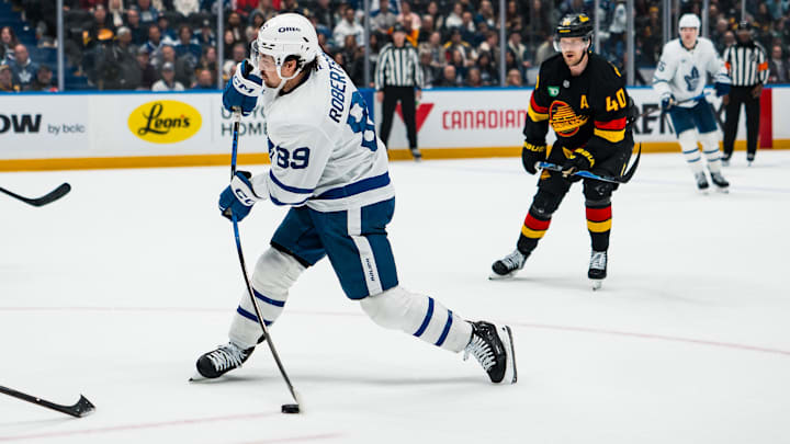 Jan 31, 2026; Vancouver, British Columbia, CAN; Toronto Maple Leafs forward Nicholas Robertson (89) shoots against the Vancouver Canucks in the third period at Rogers Arena. Mandatory Credit: Bob Frid-Imagn Images