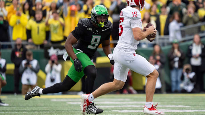 Oregon outside linebacker Blake Purchase pressures Indiana quarterback Fernando Mendoza as the Oregon Ducks host the Indiana Hoosiers Oct. 11, 2025, at Autzen Stadium in Eugene, Oregon. Oregon outside linebacker Blake Purchase pressures Indiana quarterback Fernando Mendoza as the Oregon Ducks host the Indiana Hoosiers Oct. 11, 2025, at Autzen Stadium in Eugene, Oregon.