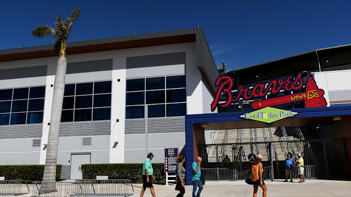 North Port, FL, USA; Fans walk around the outside of CoolToday Park during spring training.