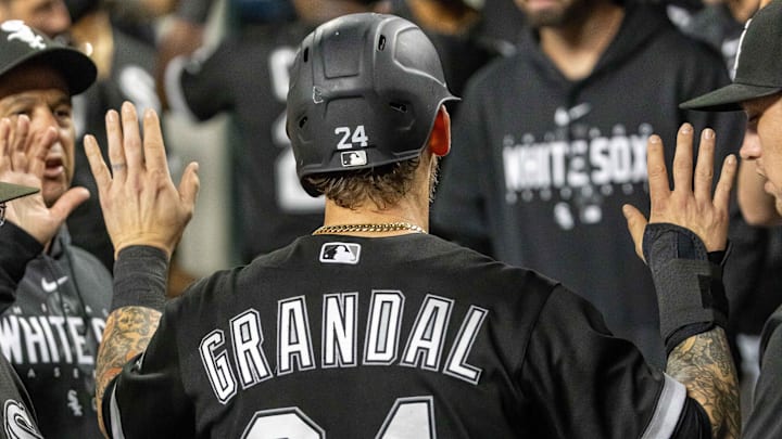 Chicago White Sox catcher Yasmani Grandal (24) scores in the eighth inning against the Detroit Tigers at Comerica Park in 2023.