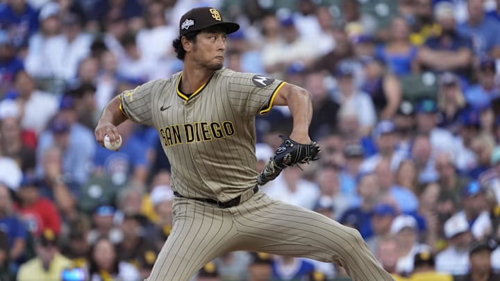 Oct 2, 2025; Chicago, Illinois, USA; San Diego Padres starting pitcher Yu Darvish (11) throws during the first inning against the Chicago Cubs during game three of the Wildcard round for the 2025 MLB playoffs at Wrigley Field. Mandatory Credit: David Banks-Imagn Images